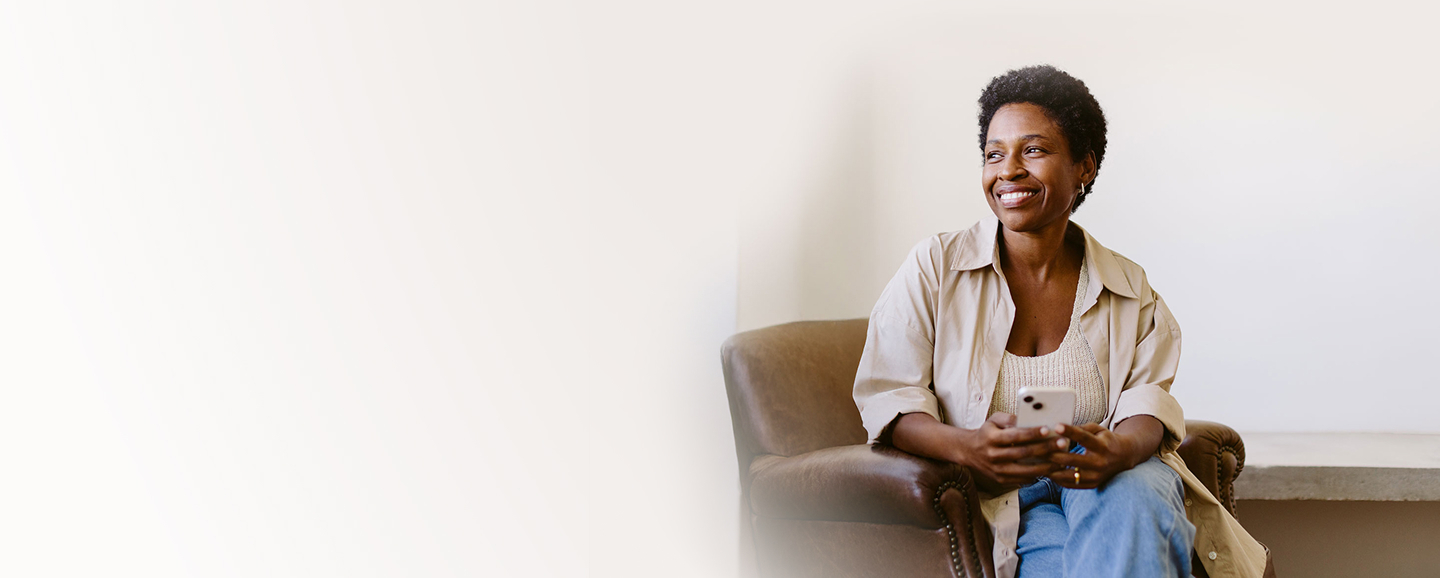 A woman sitting in the sofa