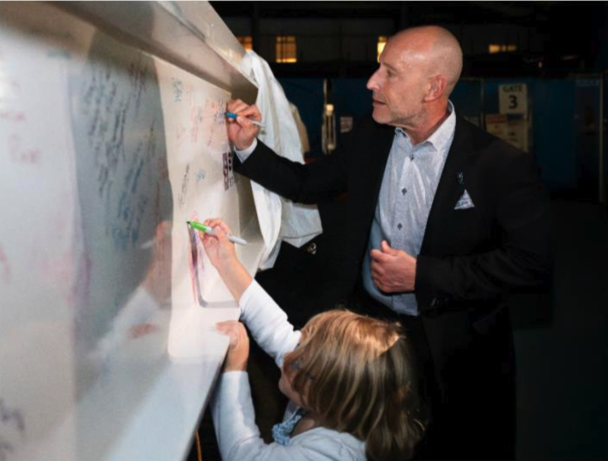 David Lubarsky, MD, MBA, President and CEO of WMCHealth, leaves his mark on history by signing the ceremonial beam for the new Brenda Fareri Pavilion - Critical Care Tower.