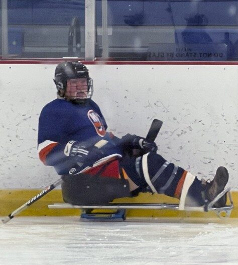 Patient on ice playing hockey after injury