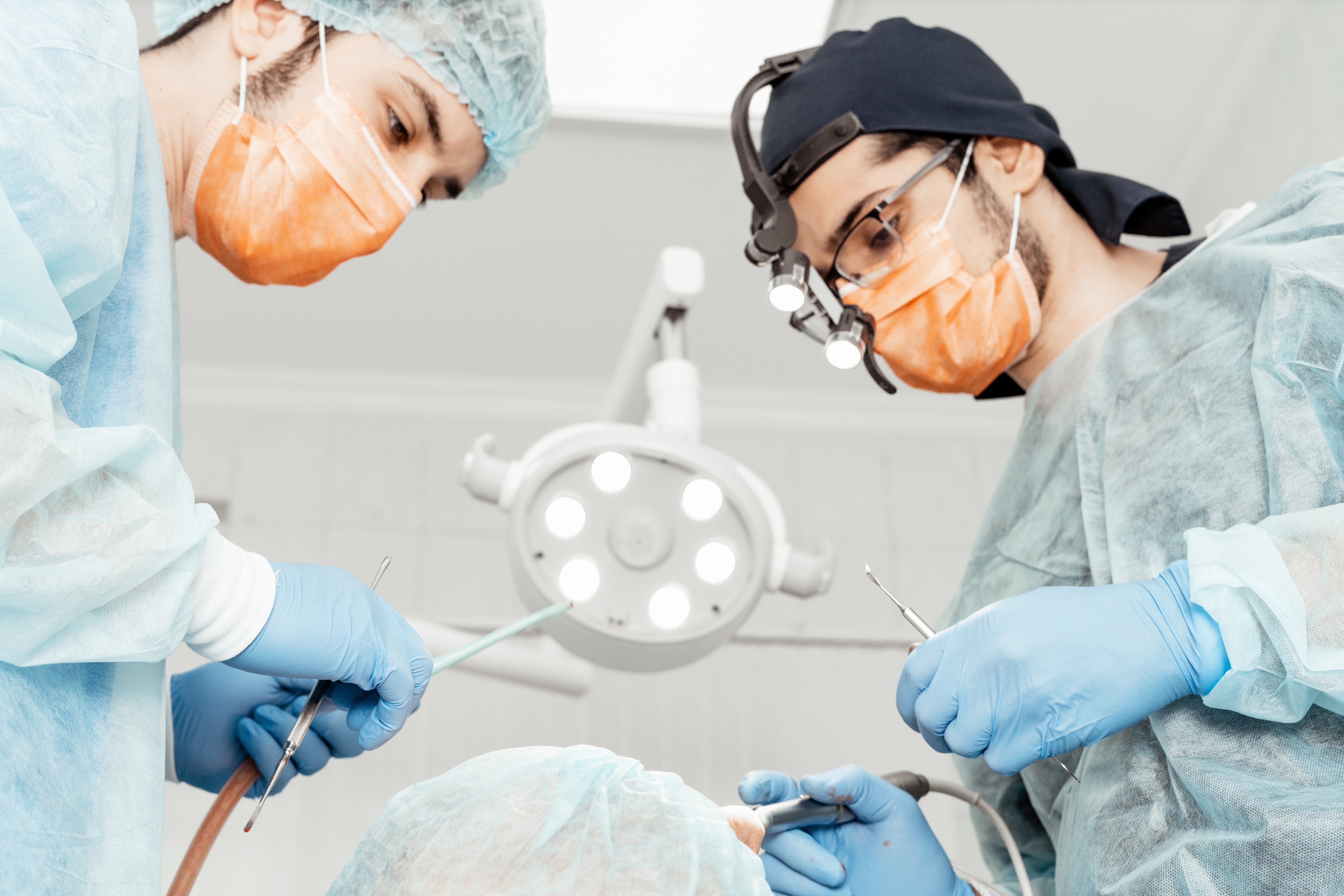 2 male dentists in surgery
