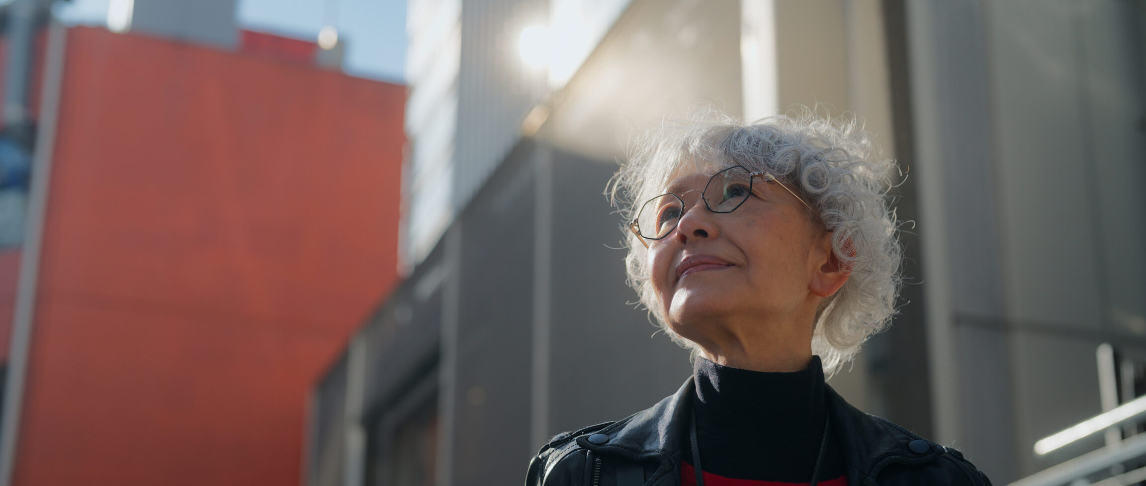Can You Have a Migraine Without a Headache? Portrait of beautiful and confident Asian senior woman in city
